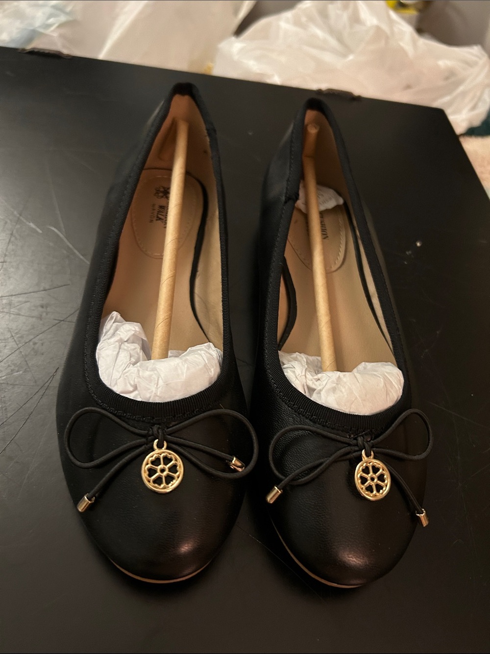 Cushion Walk by Avon Black Ballet Flats with Gold Medallion